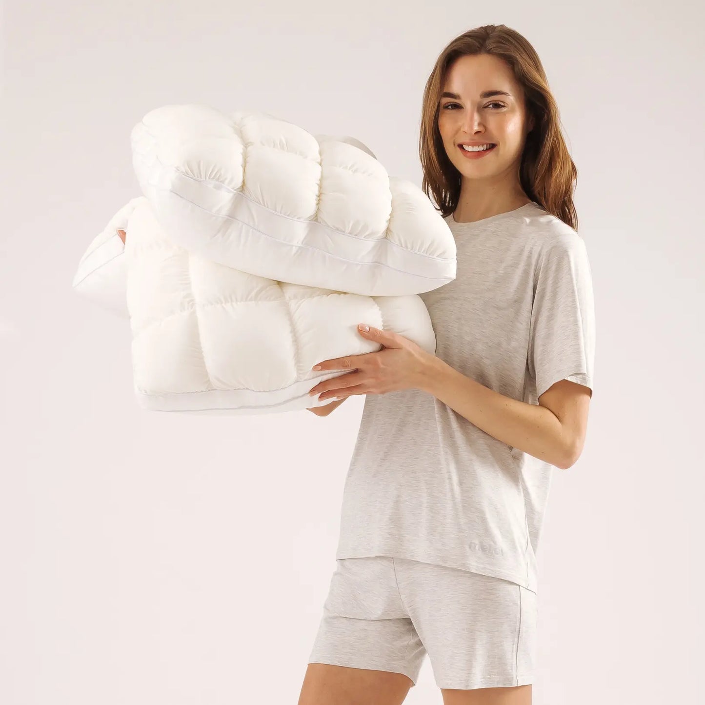 Comfortable and fluffy pillow – a quilted checkered design pillow as comfortable and soft as a cloud.