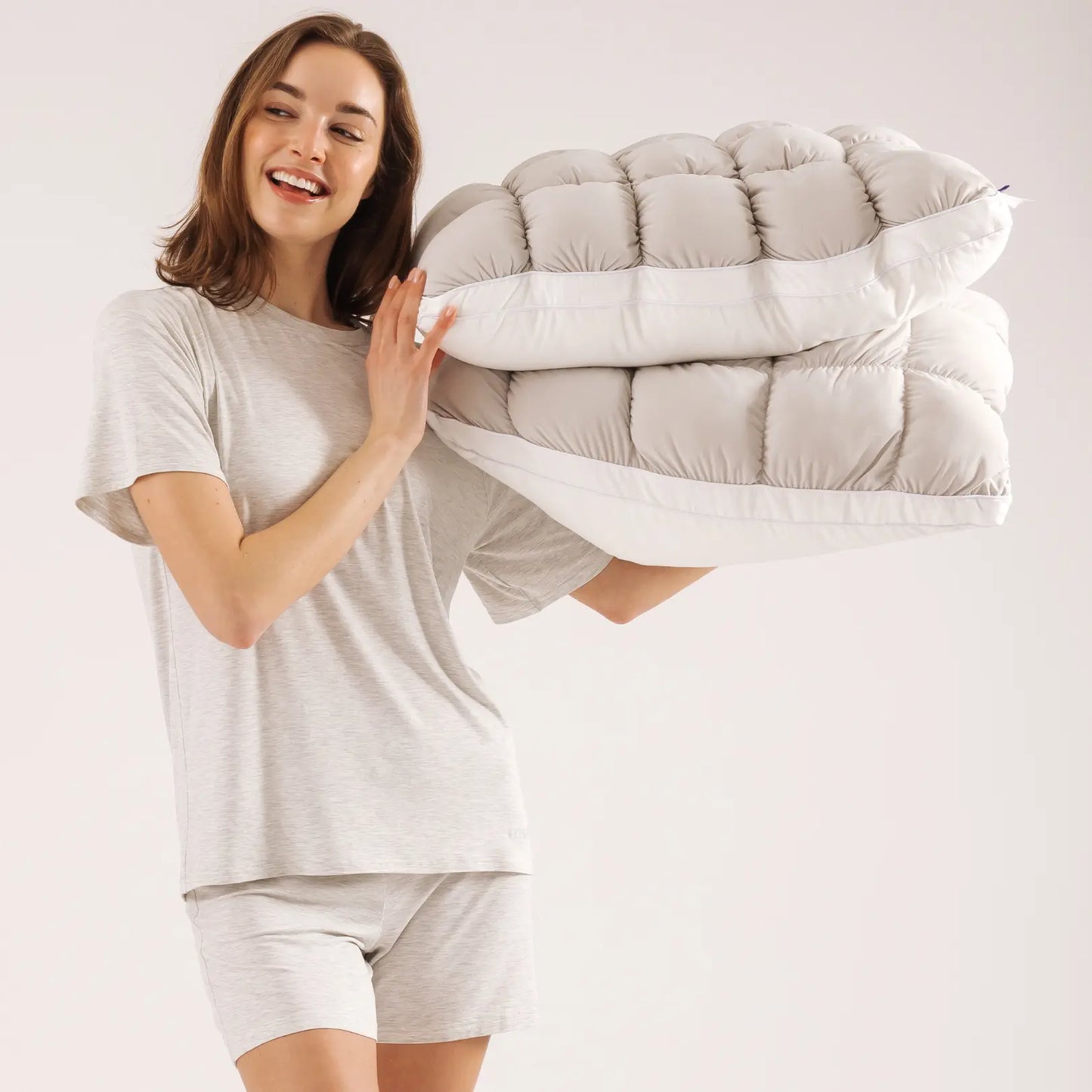 Comfortable and fluffy pillow – a quilted checkered design pillow as comfortable and soft as a cloud.